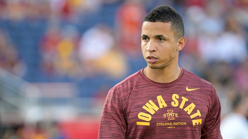 FILE - Iowa State running game coordinator Nate Scheelhaase watches players warm up before the...