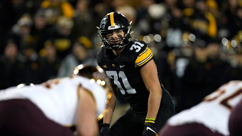 FILE - Iowa linebacker Jack Campbell (31) gets set for a play during the second half of an...