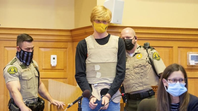 Jeremy Everett Goodale is escorted into a bond review hearing at the Jefferson County...