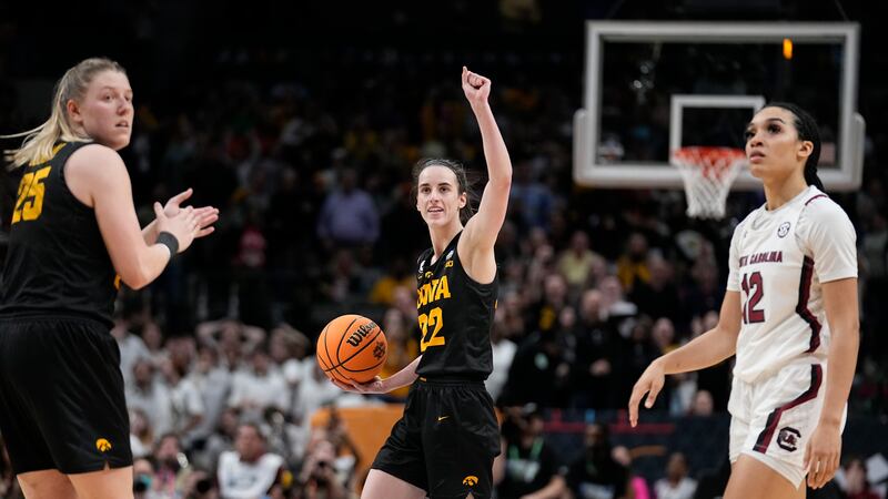 Iowa's Caitlin Clark reacts after being fouled in the final second of the second half of an...