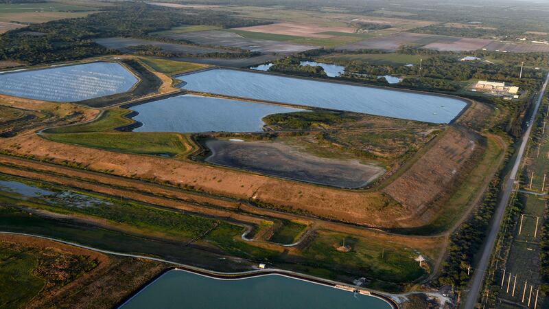 FILE - This aerial photo taken from an airplane shows a reservoir near the old Piney Point...